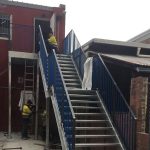 Steel staircase with handrail